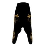 Black harem pants with gold floral design.