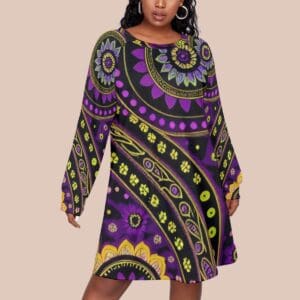 Woman wearing colorful patterned dress.