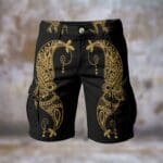 Black shorts with elaborate gold patterns.