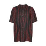 Black shirt with red abstract pattern.