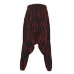 Black harem pants with red pattern design.