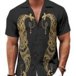 Man wearing black shirt with gold design.