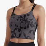 Woman in patterned gray sports bra.