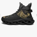 Black sneaker with intricate gold designs.