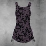 Purple dress with black floral pattern.