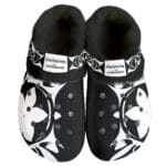 Black and white floral clogs with fur lining.