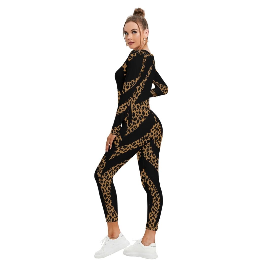 Woman in leopard print jumpsuit, white sneakers.