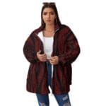 Woman in red and black patterned jacket.