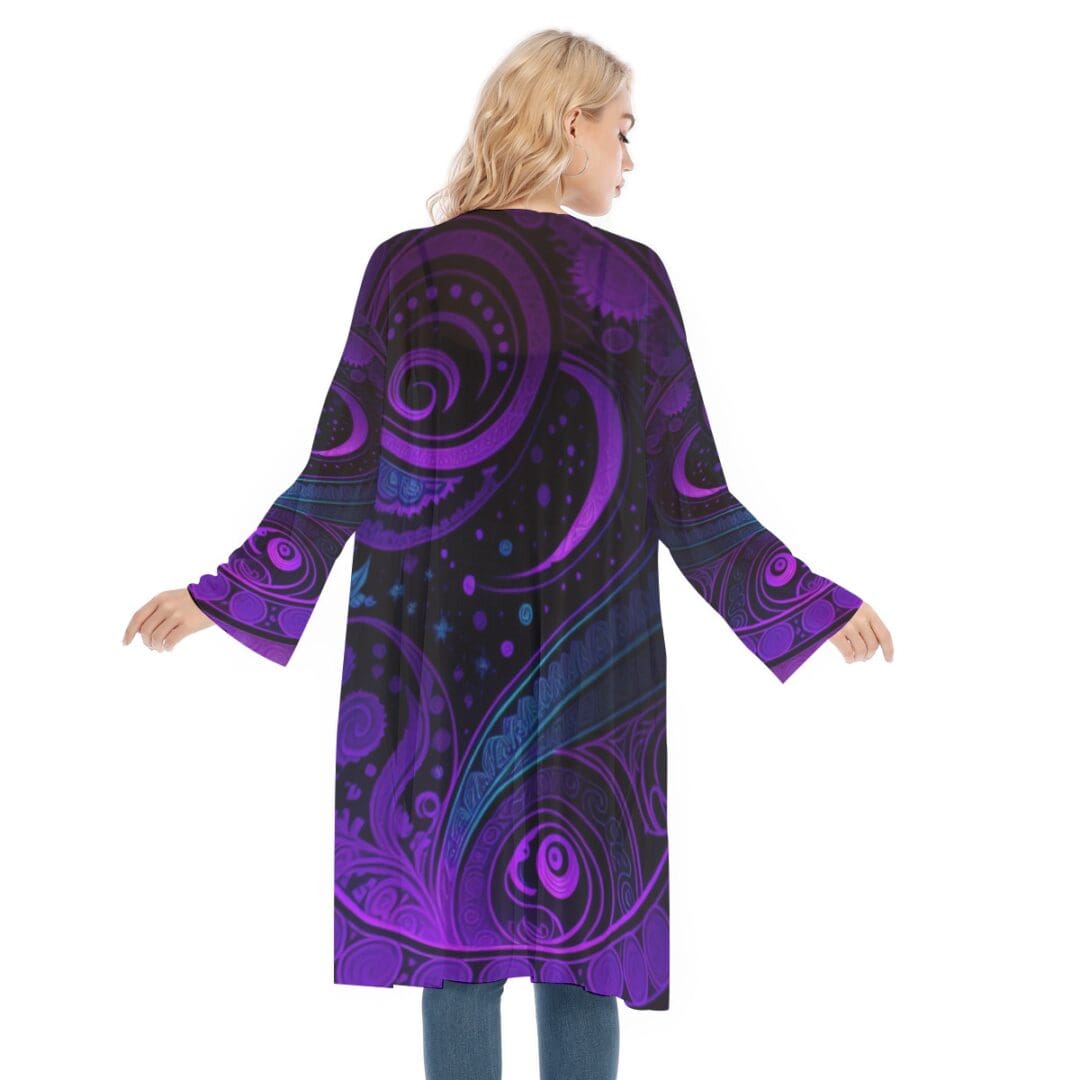 Woman wearing purple patterned long coat.