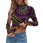 Woman in colorful mandala-patterned crop top.