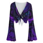 Purple and black patterned bell sleeve top.