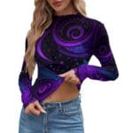 Woman in colorful patterned crop top.