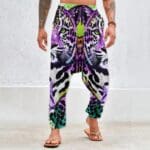 Colorful leopard print pants on person.