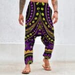 Man wearing colorful patterned harem pants.