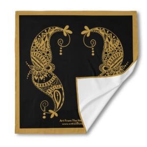 Ornate gold paisley design on black background.