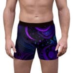 Man wearing colorful, patterned boxer shorts.