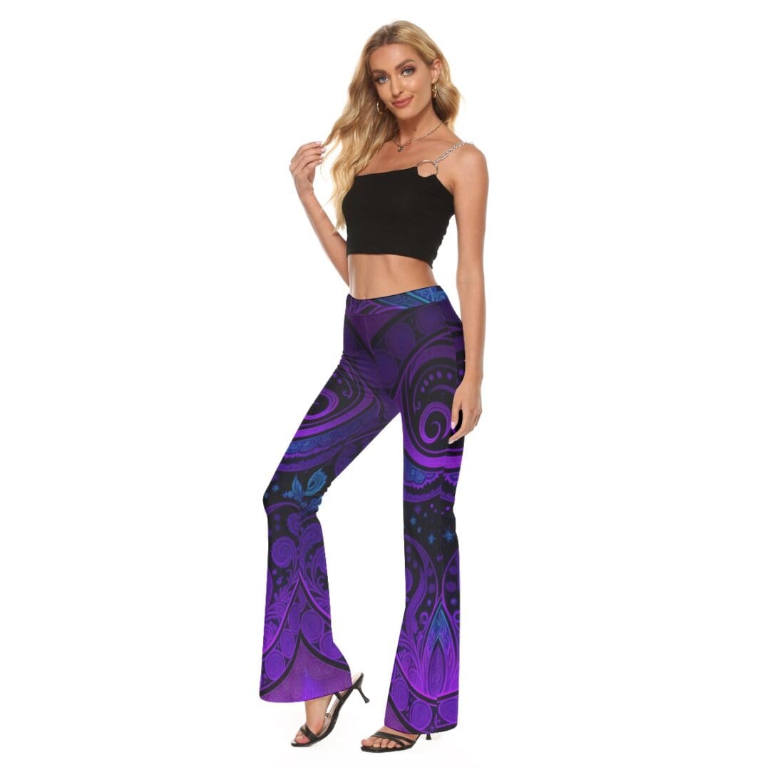 Woman in black top and purple pants.