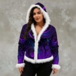 Woman in purple patterned hooded jacket.